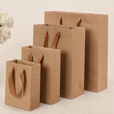 China Lovely Delicate Hot Sale Kraft Paper Bags With Handles Gift Bags Custom Logo Packaging Hand Bags For Girl for sale