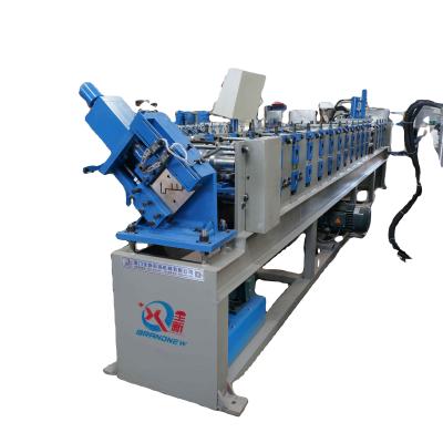 China Construction worksÂ   Wholesale Prefab House Making Machine Container House Machine House Container Roll Forming Machine for sale