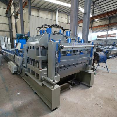 China Construction worksÂ   Prefabricated Steel Metal House Container Office Container House Series Top Beam Roll Forming Machine for sale