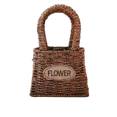 China Durable Vegetable Plankton Woven Flower Pot Flower Pot Handmade Wicker Flower Girl Decoration Basket With Handle for sale