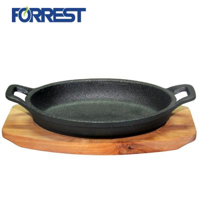 China Viable Hot Selling Cookware Dish Cast Iron Nonstick Frying Pan/Pan With Wooden Base Tary's Fry for sale