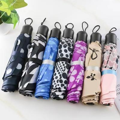 China Durable Wholesale low price mini beautiful alloy 8-bone umbrella foreign trade gifts plaid folding umbrella advertising umbrella for sale