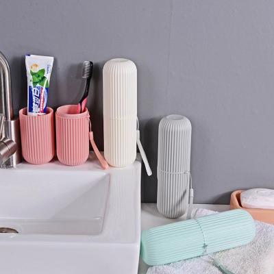 China Sustainable Vertical striped cup set creative simple toothbrush cup toothpaste storage box travel toothbrush box portable mouthwash cup. for sale