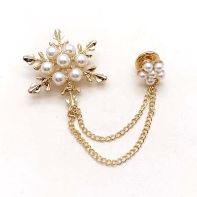 China ALLOY Fashion Dress Decoration Chain Brooch Pins Snowflake Shaped Pearl Brooch With Chain for sale