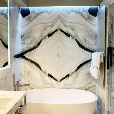 China Modern Sonal White Marble Slabs Countertops Panda White Marble Stair White Marble Matchbook Slab Wall Shower Flooring for sale