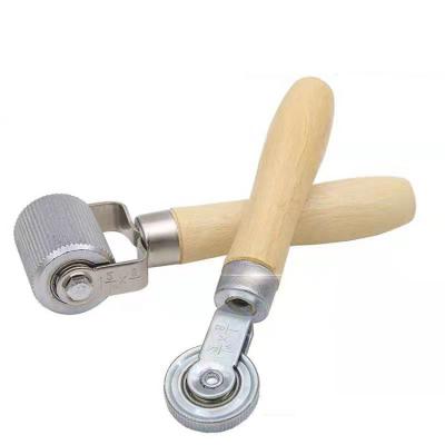 China Wooden Auto Tire Rapair Tire Spot Repair Tool Ball Bearing Handle Stapler and Roller Car Repair Tool for sale