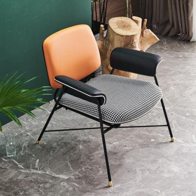 China Dining Chair Luxury Cafe Leisure Chair Contemporary Restaurant Fabric Dining Armchair for sale