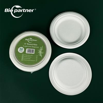 China Eco-Friendly 7 Inch Disposable White Round Oilproof Heavy Duty Compostable Sugar Cane Disposable Dishes Take Out Food Container For Party for sale