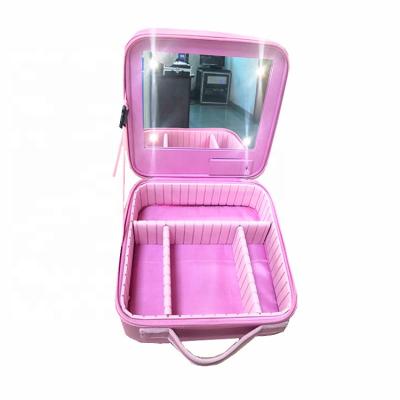 China Fashion Customized Mirror Pink Leather Travel Cosmetic Bag With Led Light Make Up Organizer Box for sale