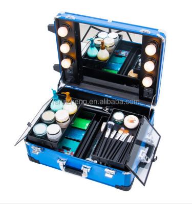 China Recyclable Professional Blue Beauty Aluminum Lighted Makeup Train Case With Lights Mirror for sale