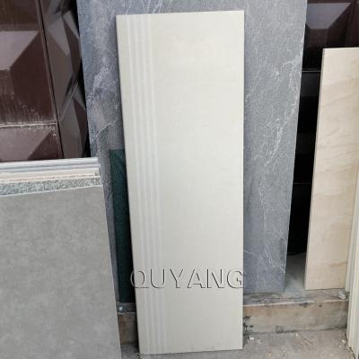 China Europe QUYANG factory price non-slip beige stairs tiles marble look indoor porcelain stair floor ceramic step tiles for sale