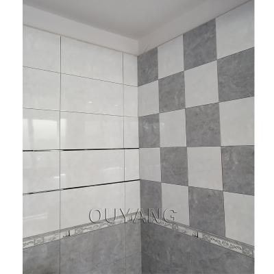 China Europe QUYANG Modern Design 300x600 Kitchen Decorative Bathroom White Gray Ceramic Wall Tiles Polished Porcelain Floor Tile for sale