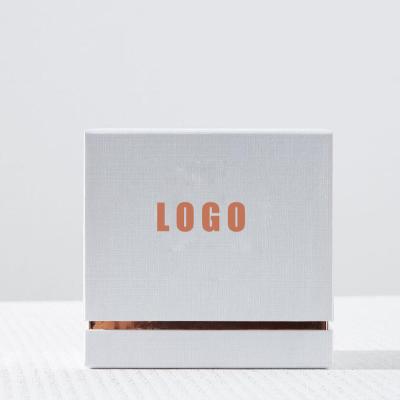 China Handmade Luxury Custom Embossing Foiled Logo Perfume Oil Packaging Cardboard Box With Lid for sale