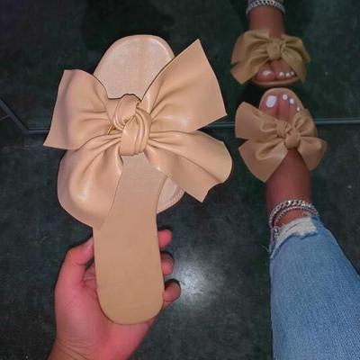 China 2023 Summer Fashion Women Leather Flat Fashion Trend Shoes Latest Simple Butterfly Ladies Sandals Slipper Nude Platform for sale