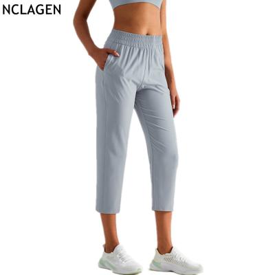 China Breathable Lightweight Quick Dry Women Sports Casual Pants Wholesale High Quality Breathable Jogger Pants Loose Fit Running Capris for sale