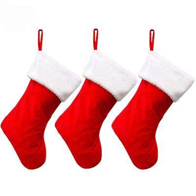 China Festival Home Decoration Hot Selling Red And White Christmas Decoration Christmas Socks Gift Bags Christmas Stockings for sale