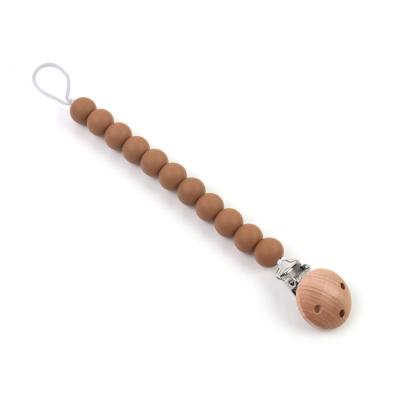 China BPA Baby Pacifier Clip Silicone Bead Free Pacifier Holder Wood Clip for sale