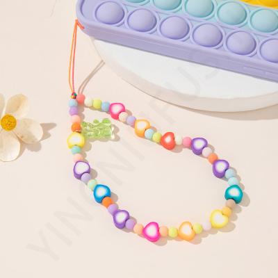 China Creative Mixed Color Cute Acrylic Soft Ceramic Anti-lost Design Chain Mobile Phone Chain Mobile Ornaments Lanyard Female Short for sale