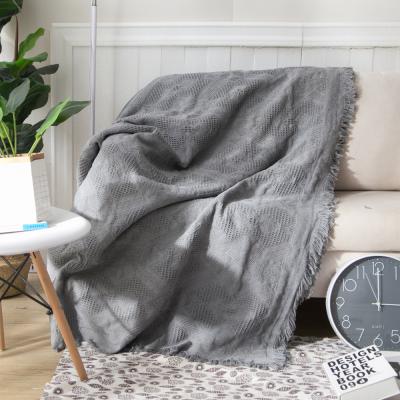 China Waterproof Jacquard Super Soft Chunky Style Gray Woven Throw Blanket With Tassel for sale