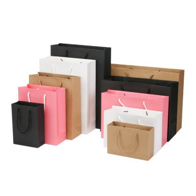 China Recycled Materials Custom Printed Your Logo Cardboard Packaging Recyclable Kraft Gift Craft Shopping Paper Bag for sale