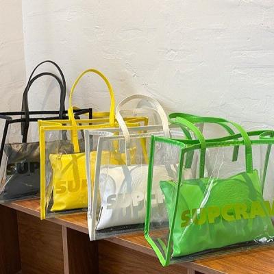 China 2021 new fashion tote bag large capacity transparent jelly bags handheld iridescent shape single shoulder bag for sale