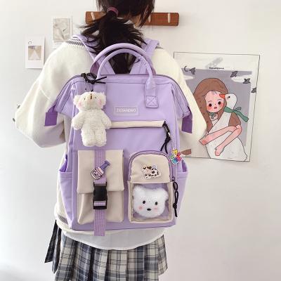 China 2021 fashion popular anti-friction backpack in leisure nylon material school bags for high school girls for sale