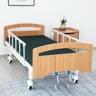 China Cama de hospital manual ajustável que levanta para trás a cabeça de madeira da cama das camas do estilo do hospital com trilhos à venda