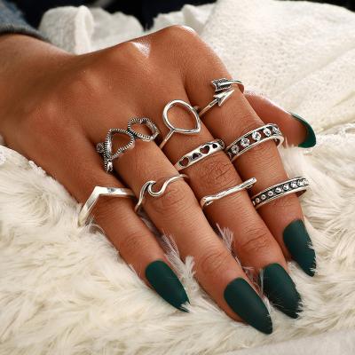 China Vintage 9 Pcs Boho Water Drop Wave Flower Heart Arrow Kitten Silver Midi Rings Lady Silver Charm Party Accessories for sale