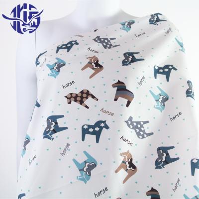 China Cheap Twill Tear-Resistant Cotton Fabric Rocking Horse Running Pattern Poplin Digitally Printed for sale