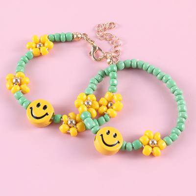 China Cute Green Smiley Bracelet Happy Face Yellow Stretch Beaded Seed Beads Smiley Face Bracelet For Kid for sale