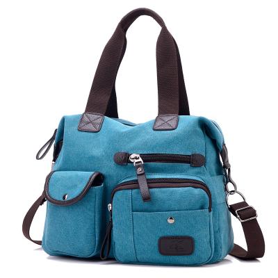 China New large canvas bag single shoulder messenger sports bag leisure travel women's portable handbag for sale