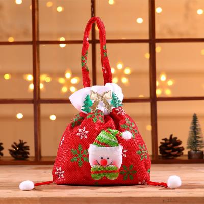 China Non Woven Fabric Holiday Party Decoration Santa Claus Christmas Doll Picture Decoration With Drawstring Gift Bag for sale