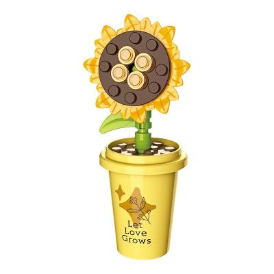 China Non-toxic JAKI Assembling Diy Flower Bouquet Sunflower Building Blocks Brick Toy Sets for Children for sale