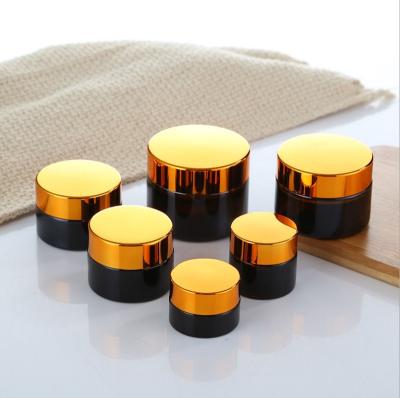 China Skin Care Cream Cosmetic Packaging Matte Frosted Amber Black Glass Cream Jar for sale