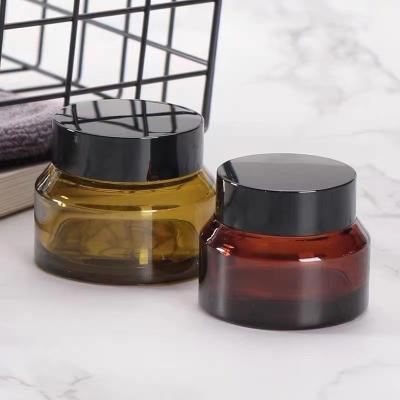 China Cosmetic Skin Care Cream Packaging 15g 30g 50g 60g 100g Sloping Shoulder Frosted Amber Glass Cosmetic Cream Jar for sale