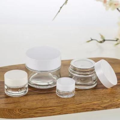 China 15ml Cosmetic 30ml 50ml 100ml Clear Transparnt Face Cream Jar Glass Cream Jar With White Lid for sale