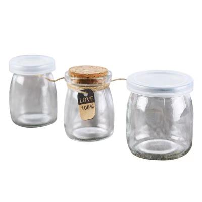 China Stocked 150ml Empty Pudding Glass Jar For Milk Jam With Wooden Stopper Cork for sale