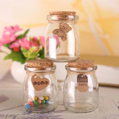 China 100ML 150ML 200ML Glass Bottle EMPTY Pudding Stocked Glass Jar For Milk /Yogurt With Plastic Cap for sale