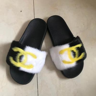 China Fashion trend factory direct women's furry warm sandals soft luxury mink fur slippers for sale