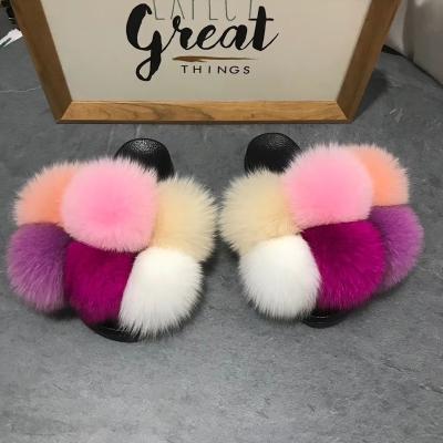 China Fashion Trend New Fashion Fur Ball Slippers Soft Outdoor Ladies Fur Slippers Custom Made Fur Slippers Wholesale for sale