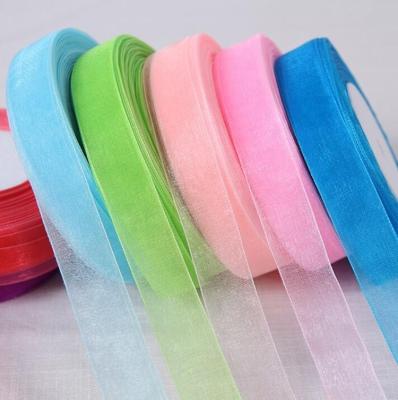 China Viable factory customized 196 colors polyester organza ribbon colorful organza ribbon roll 100% pure eco-friendly simple for sale