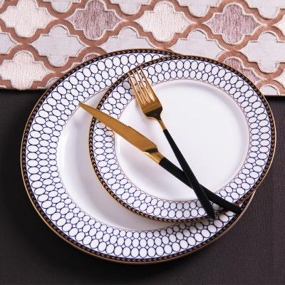 China Wholesale Viable Blue Round Rim Restaurant Bone China Gold Ceramic Charger Dish For Wedding for sale