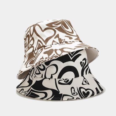 China Sun Protect 2022 New Next Stock One Side 2 Colors To Wear Bucket Hats Wholesale Volume With Heart Printing for sale