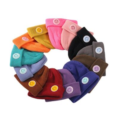 China New Coming 2021 New Coming Winter Hot Selling Smile Face Knitted Hat Amazon COMMON Skull 13 Colors Common for sale