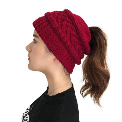 China 2021 New Coming Amazon Hot Selling COMMON 7 Colors Store Wholesale Empty Knitted Ponytail Hat For Winter for sale