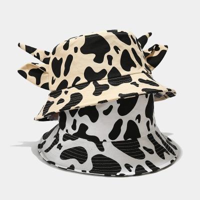 China New Coming Picture 2022 Available 2 Side Caps One Use Cow Print Bucket Colors With Ears for sale