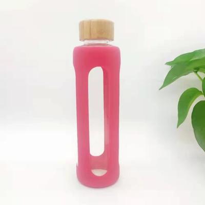 China PORTABLE Creative Bamboo Cover Silicone Cover Glass Fashion Water Bottle Ironing Outdoor Non-slip Sports Water Cup Kettle for sale