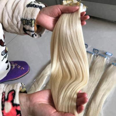 China Best Selling Remy Natural Wave Products Tape Hair Extensions for sale