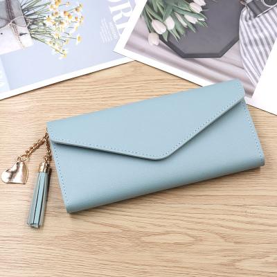 China 2021 Fashion New Design Women's Genuine Leather RFID Blocking Triple Large Capacity Ladies Wallet for sale