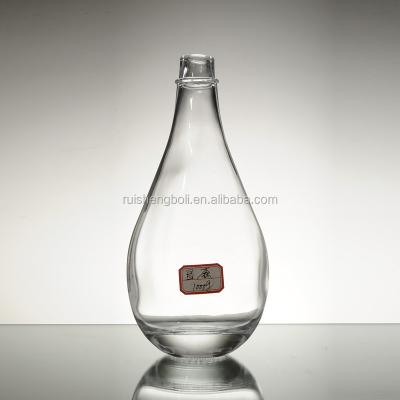 China Deep Process Hot Stamping Glass Bottle for Wine in Water Drop Shape for sale